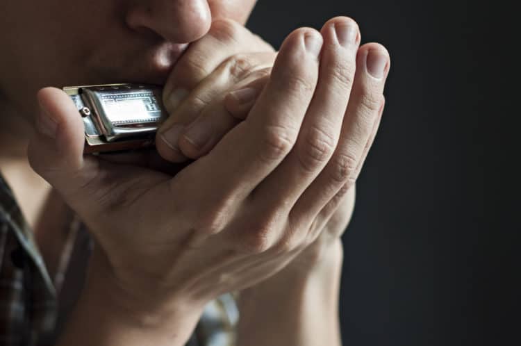 10 Awesome Rock Songs Featuring Harmonica